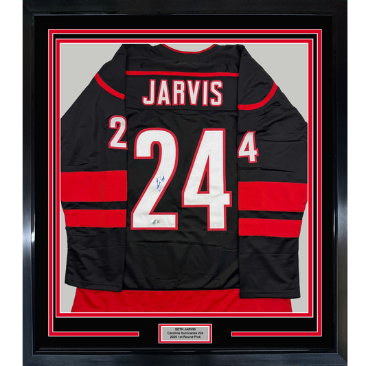 Framed Autographed/Signed Seth Jarvis 35x39 Carolina Black Hockey Jersey Beckett BAS COA
