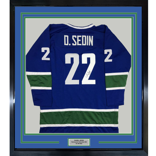 Framed Autographed/Signed Daniel Sedin 35x39 Vancouver Blue Hockey Jersey JSA COA Holo Only