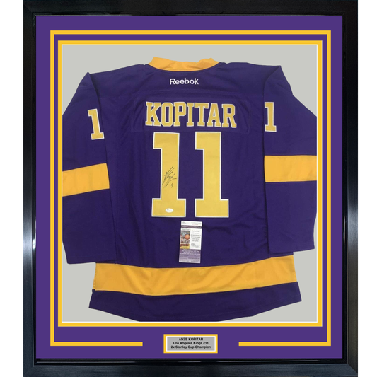 Framed Autographed/Signed Anze Kopitar 35x39 Los Angeles LA Retro Purple Hockey Jersey JSA COA
