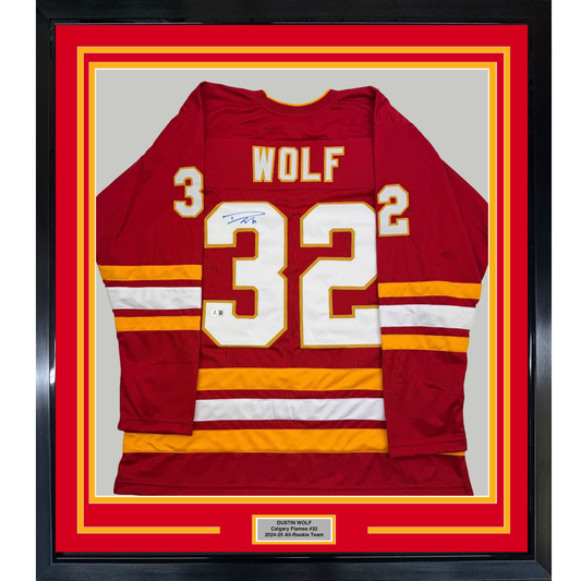 Framed Autographed/Signed Dustin Wolf 35x39 Calgary Red Hockey Jersey Beckett BAS COA