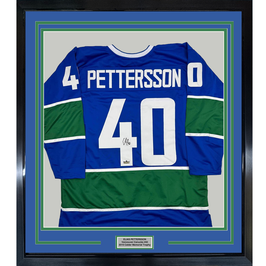 Framed Facsimile Autographed Elias Pettersson 35x39 Vancouver Blue Reprint Laser Auto Hockey Jersey