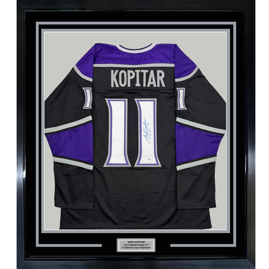 Framed Autographed/Signed Anze Kopitar 35x39 Los Angeles LA Black Hockey Jersey Beckett BAS COA #2