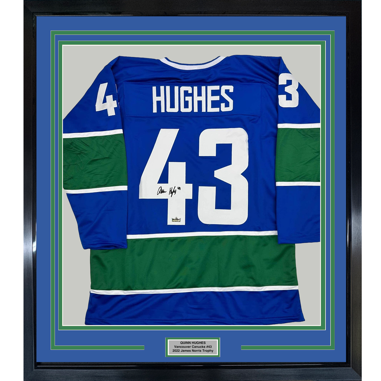 Framed Facsimile Autographed Quinn Hughes 35x39 Vancouver Blue Reprint Laser Auto Hockey Jersey