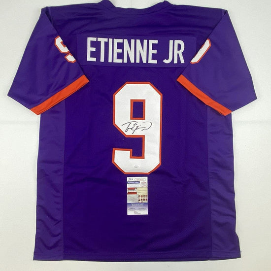 Autographed/Signed Travis Etienne Jr. Clemson Purple College Football Jersey JSA COA