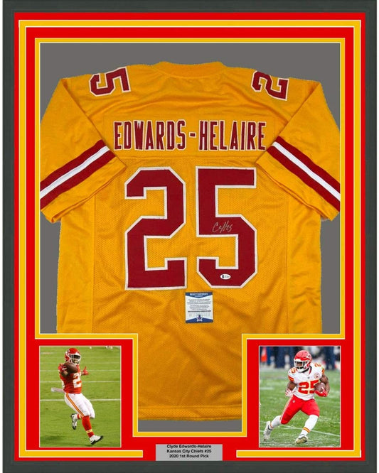 Framed Autographed/Signed Clyde Edwards-Helaire 35x39 Kansas City Yellow Football Jersey Beckett BAS COA
