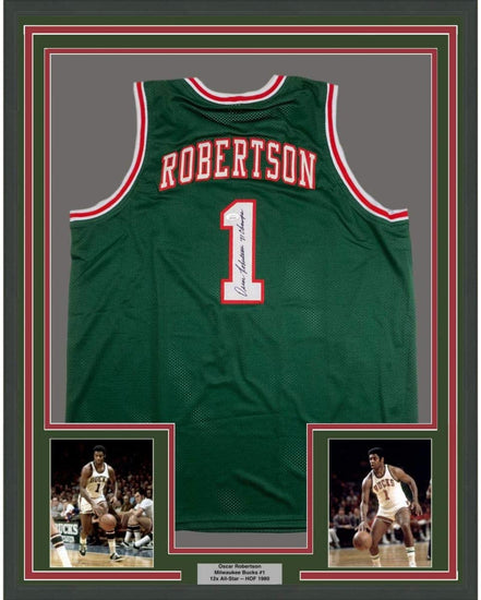 Framed Autographed/Signed Oscar Robertson 71 Champs 35x39 Milwaukee Green Basketball Jersey JSA COA