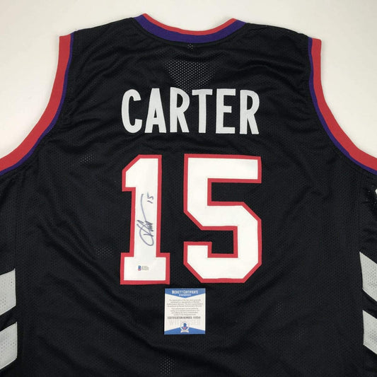 Autographed/Signed Vince Carter Toronto Black Basketball Jersey Beckett BAS COA
