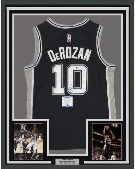 Framed Autographed/Signed DeMar DeRozan 35x39 San Antonio Black Basketball Jersey Beckett BAS COA